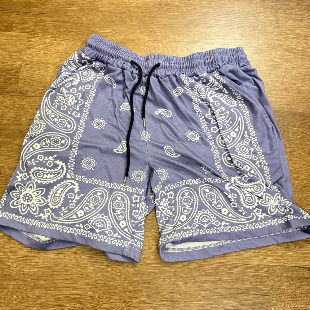 ROMWE Purple and White Ruffled Shorts for men’s size (M)